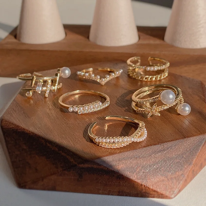 Gold plated color Alloy material Pearl index finger ring opening adjustable rings for women
Gold plated color Alloy material Pearl index finger ring opening adjustable rings for women