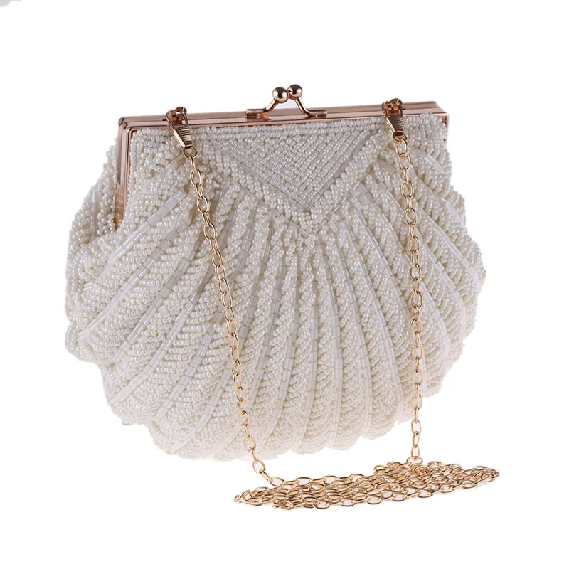 2021 New white bag Handmade Pearl Birthday Party Mini shell clutch Beaded Hand Bag Fashion bridal bag
2021 New white bag Handmade Pearl Birthday Party Mini shell clutch Beaded Hand Bag Fashion bridal bag
