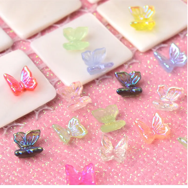 50pcs/bag Factory wholesale butterfly nail art resin ice Shimmer color mixed butterfly nail decoration
50pcs/bag Factory wholesale butterfly nail art resin ice Shimmer color mixed butterfly nail decoration