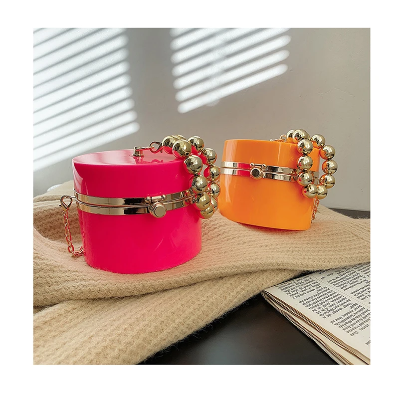 2021 Mini Famous Brand Women Portable Box Handbags Acrylic PVC Messenger Bag Metal Beads Strap Shoulder Bag Round Purses Bolsa
2021 Mini Famous Brand Women Portable Box Handbags Acrylic PVC Messenger Bag Metal Beads Strap Shoulder Bag Round Purses Bolsa