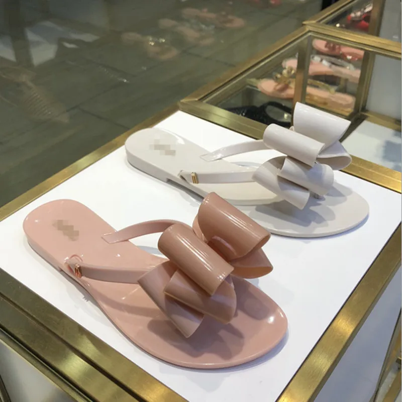 Jelly shoes with three-layer bow sandals sandals flip-flops and flip-flops
Jelly shoes with three-layer bow sandals sandals flip-flops and flip-flops