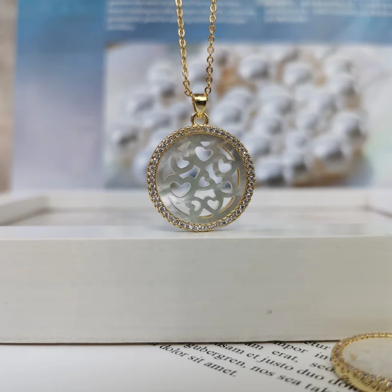 Fashion New Girl Necklace zircon mother of pearl shell hollow love pendant for women, Gold color
Fashion New Girl Necklace zircon mother of pearl shell hollow love pendant for women, Gold color