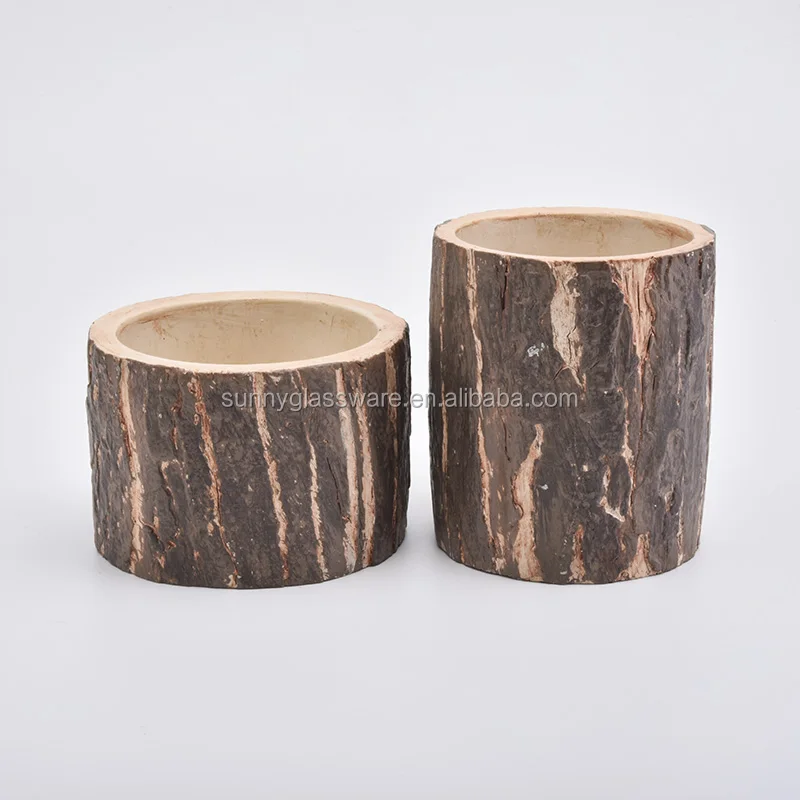 short concrete candle containers with tree design