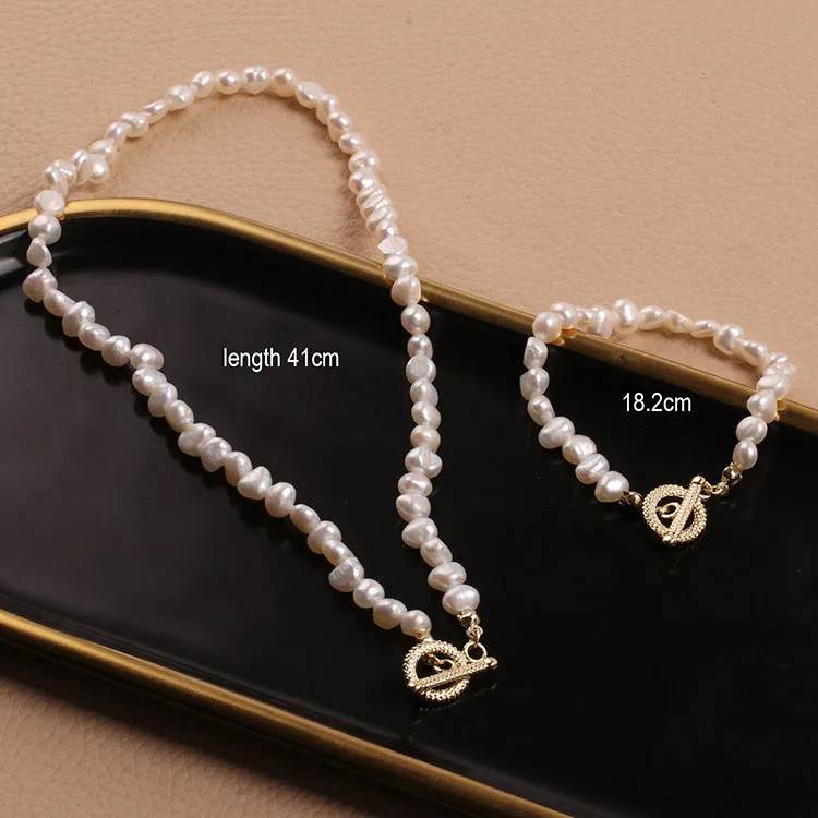 hawaiian jewelry 18k gold plated baroque freshwater pearl necklace bracelet jewelry set for women
hawaiian jewelry 18k gold plated baroque freshwater pearl necklace bracelet jewelry set for women