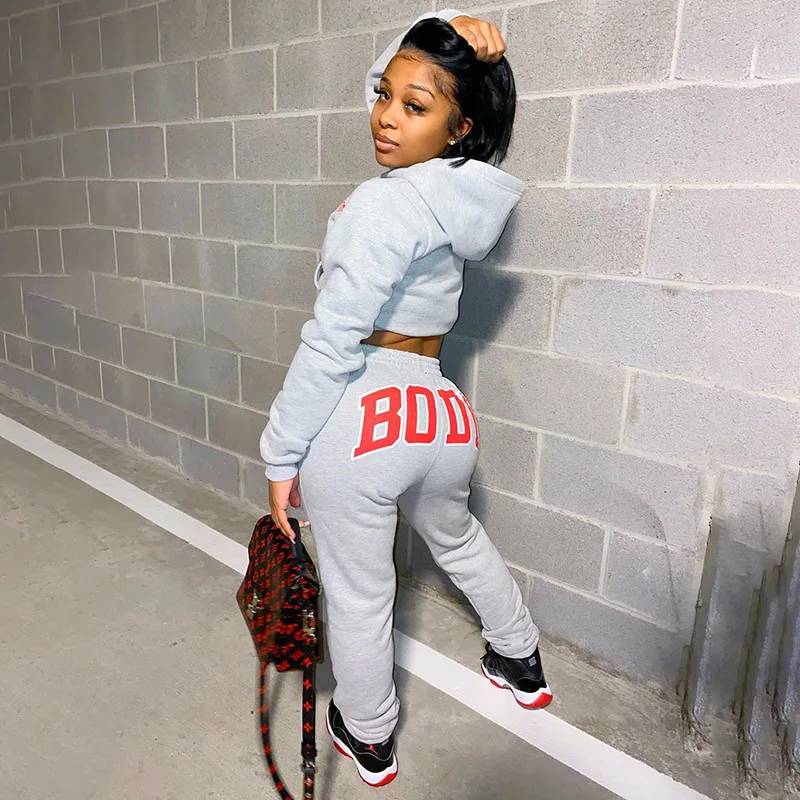 Wholesale new fashion womens winter 2 piece set long sleeve crop hooded sweaters body letter print outfit sweat suits, Photo shows
Wholesale new fashion womens winter 2 piece set long sleeve crop hooded sweaters body letter print outfit sweat suits, Photo shows