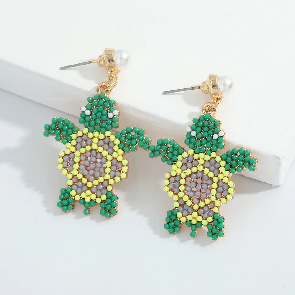 Cartoon Sea Turtle Pearl Drop Earrings Creative Animal Turtle Shape Rice Bead Drop Earrings for Women
Cartoon Sea Turtle Pearl Drop Earrings Creative Animal Turtle Shape Rice Bead Drop Earrings for Women
