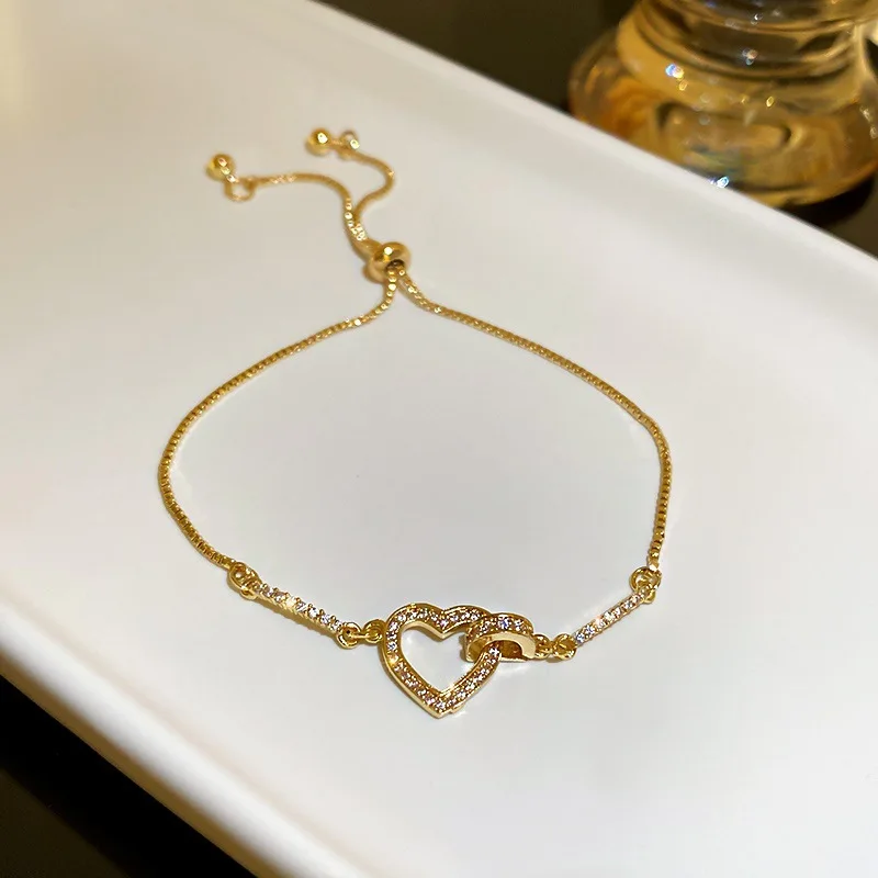 Real 18k Gold Plated Hollow Heart Shaped Bracelet Bling Bling Cubic Zircon Love Heart Bracelet for Valentine's Day
Real 18k Gold Plated Hollow Heart Shaped Bracelet Bling Bling Cubic Zircon Love Heart Bracelet for Valentine's Day