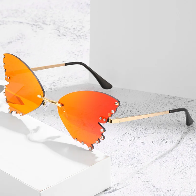 DCOPTICAL 2021 Shaped Butterfly Wing Transparent Lens Diamond Bling Frameless metal Leg Fashion UV400 Women shades Sunglasses
DCOPTICAL 2021 Shaped Butterfly Wing Transparent Lens Diamond Bling Frameless metal Leg Fashion UV400 Women shades Sunglasses