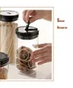 /product-detail/eco-friendly-black-and-white-lid-clear-glass-mason-jar-with-plastic-lid-62344296279.html