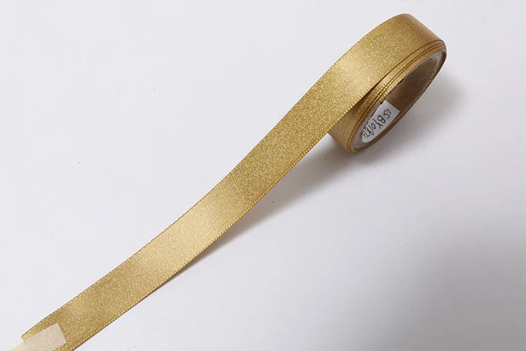woven wired gold satin glitter edged metallic curling ribbon