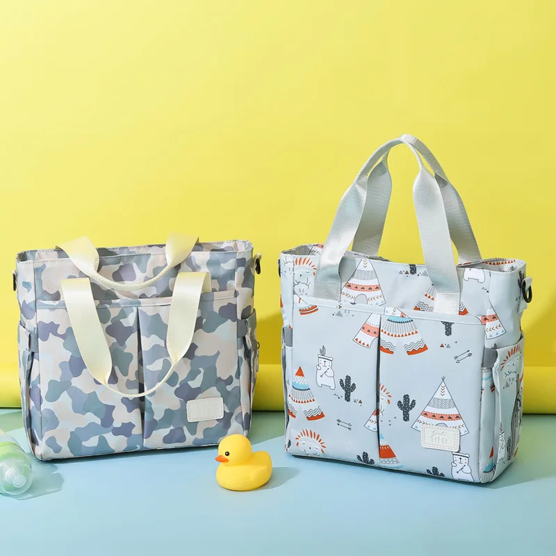 Colorful print fashion waterproof material big capacity mummy baby shoulder tote pink diaper bag 
Colorful print fashion waterproof material big capacity mummy baby shoulder tote pink diaper bag
