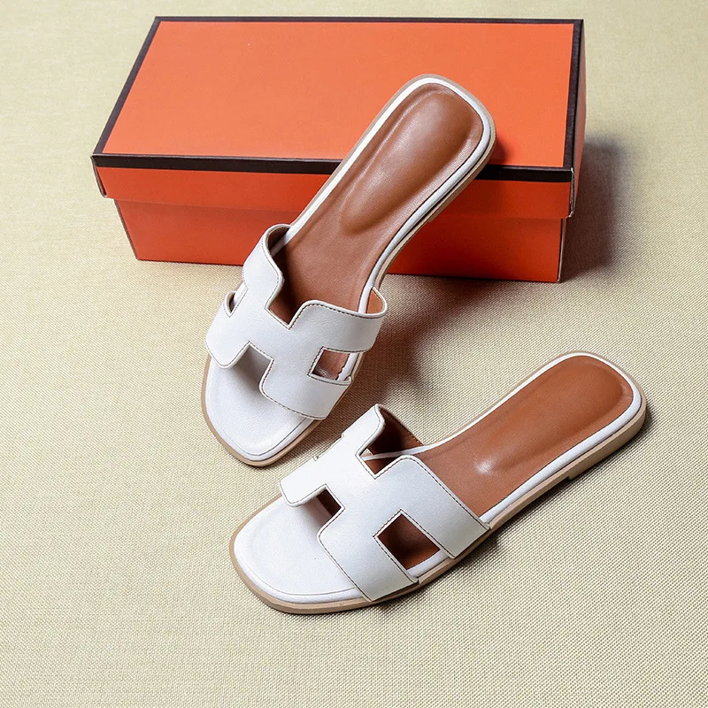 2021 Summer New Hot Selling High Quality Leather Slippers Beach Women White Sandal Slides Shoes
2021 Summer New Hot Selling High Quality Leather Slippers Beach Women White Sandal Slides Shoes