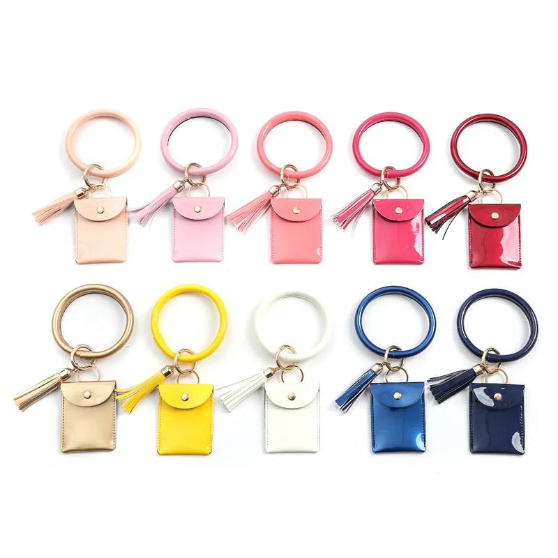 New woman bags wallet pure color PU leather keyring bracelet keychain fringed small wallet., Customized
New woman bags wallet pure color PU leather keyring bracelet keychain fringed small wallet., Customized