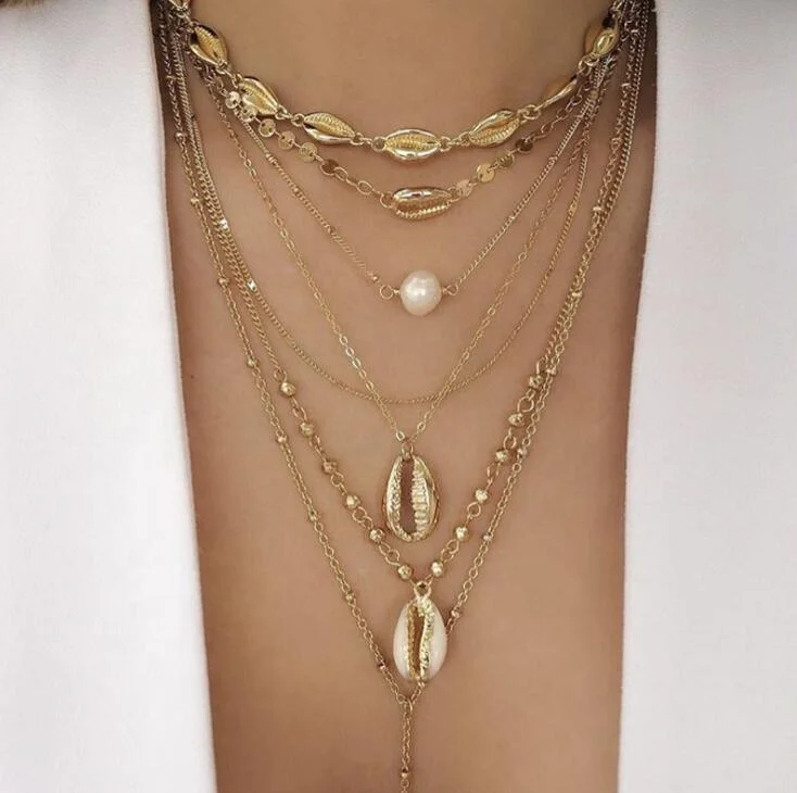Vintage Gold Plated Bohemian Ocean Beach Long Conch Shell Pearl 6 Pieces Multilayer Necklace
Vintage Gold Plated Bohemian Ocean Beach Long Conch Shell Pearl 6 Pieces Multilayer Necklace