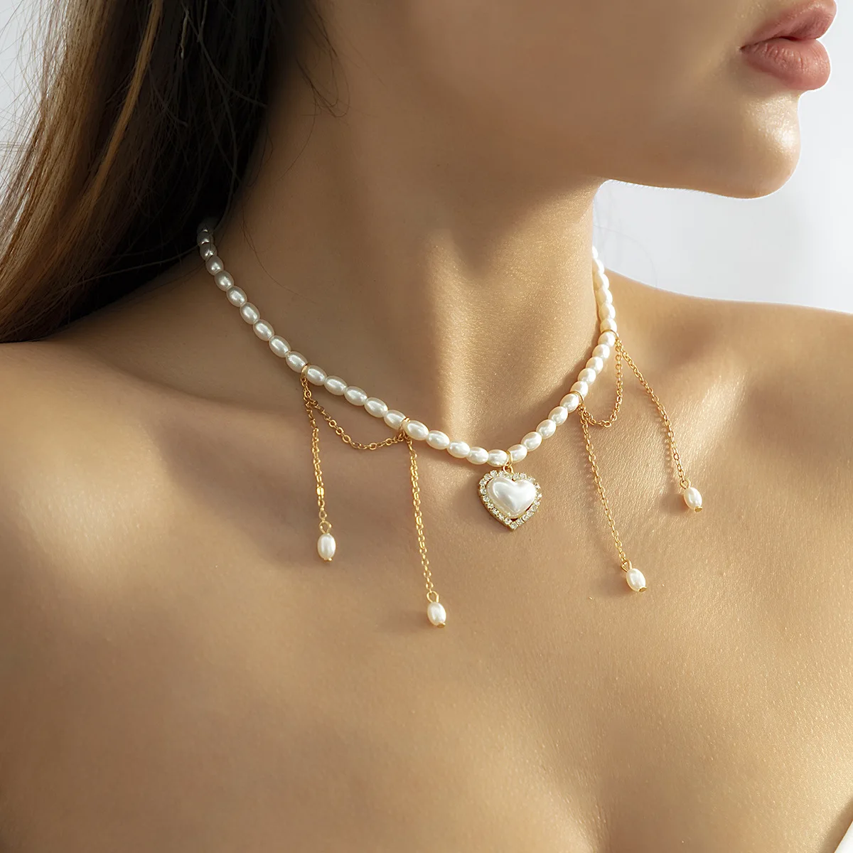 Fashion Style Tassel Crystal Heart Pendant Necklace collana personalizzata Hot Selling Pearl Heart Charm Necklace
Fashion Style Tassel Crystal Heart Pendant Necklace collana personalizzata Hot Selling Pearl Heart Charm Necklace