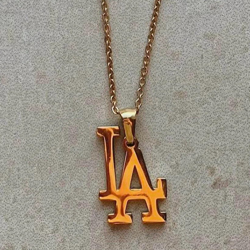 Dainty Gold Charm Necklace Stainless Steel Custom Basketball Logo 18K Gold Los Angeles Dodgers LA Pendant Necklace Jewelry
Dainty Gold Charm Necklace Stainless Steel Custom Basketball Logo 18K Gold Los Angeles Dodgers LA Pendant Necklace Jewelry