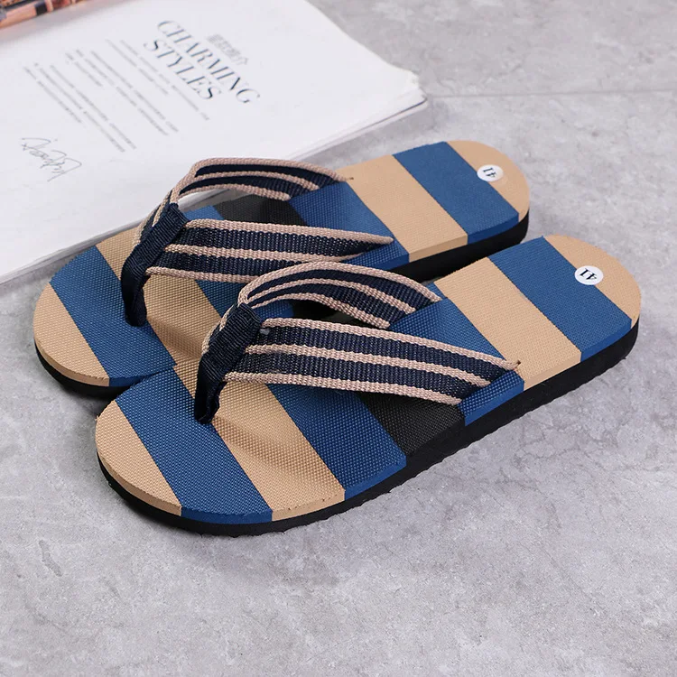 Wholesale and retail summer men's indoor and outdoor non-slip slippers striped color matching beach leisure flip-flops, Black/blue/grey
Wholesale and retail summer men's indoor and outdoor non-slip slippers striped color matching beach leisure flip-flops, Black/blue/grey