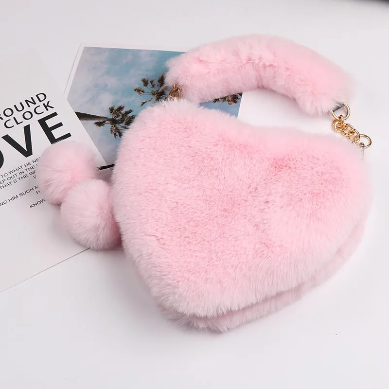 2021pink faux fur bags ladies heart shaped purses fashion plush handbags for women chain purse
2021pink faux fur bags ladies heart shaped purses fashion plush handbags for women chain purse