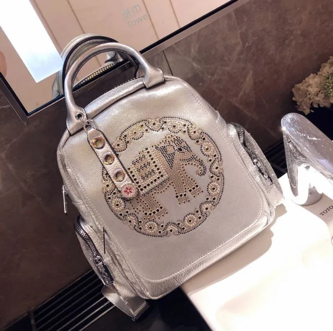 TLB-8D398 2021 hot sale lady silver backpack soft PU Leather crystal elephant shoulder bag
TLB-8D398 2021 hot sale lady silver backpack soft PU Leather crystal elephant shoulder bag
