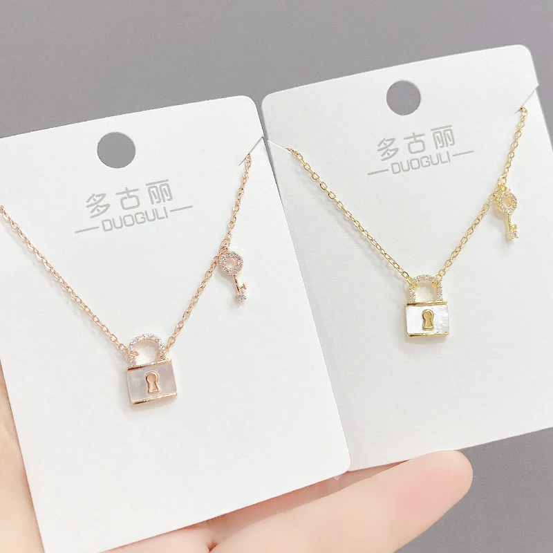 XL61705 Fashion design gold plated brass zircon women jewelry pearl shell mother lock key pendant necklaces
XL61705 Fashion design gold plated brass zircon women jewelry pearl shell mother lock key pendant necklaces