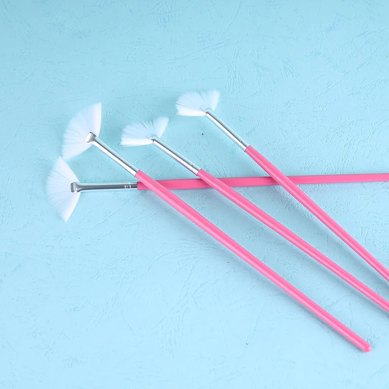Wholesale Fan shape dust nail art brush pink handle white hair dust brush, Customized
Wholesale Fan shape dust nail art brush pink handle white hair dust brush, Customized