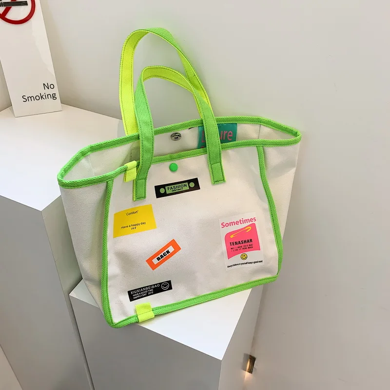 Fashion Popular Logo Collision Color Originality Canvas Lady Shoulder Bag Korea Ins Art Canvas Reusable Shopping Tote Bag
Fashion Popular Logo Collision Color Originality Canvas Lady Shoulder Bag Korea Ins Art Canvas Reusable Shopping Tote Bag