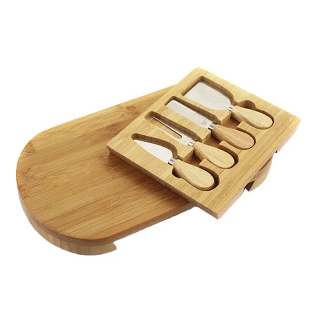Natural and Eco-friend Bamboo Cheese Board with Cutlery Set New design oak cheese board 4pcs with set Knife Tools accept OEM, Natural wood colour
Natural and Eco-friend Bamboo Cheese Board with Cutlery Set New design oak cheese board 4pcs with set Knife Tools accept OEM, Natural wood colour