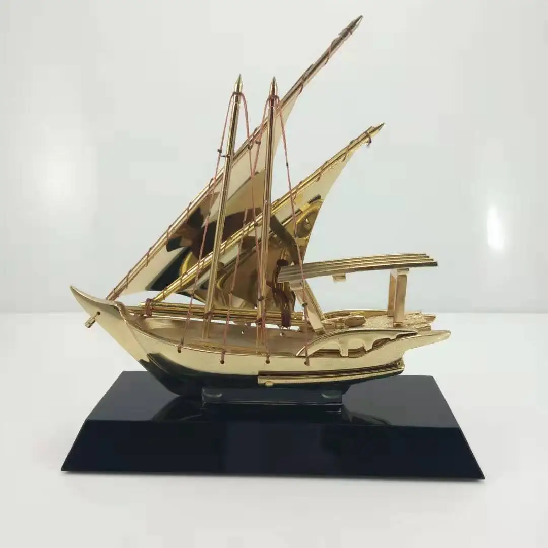 gold plated metal ship model trophy crystal glass