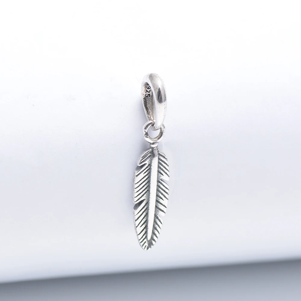 Custom jewelry fine silver 925 feather dangle charm for bracelet making
Custom jewelry fine silver 925 feather dangle charm for bracelet making