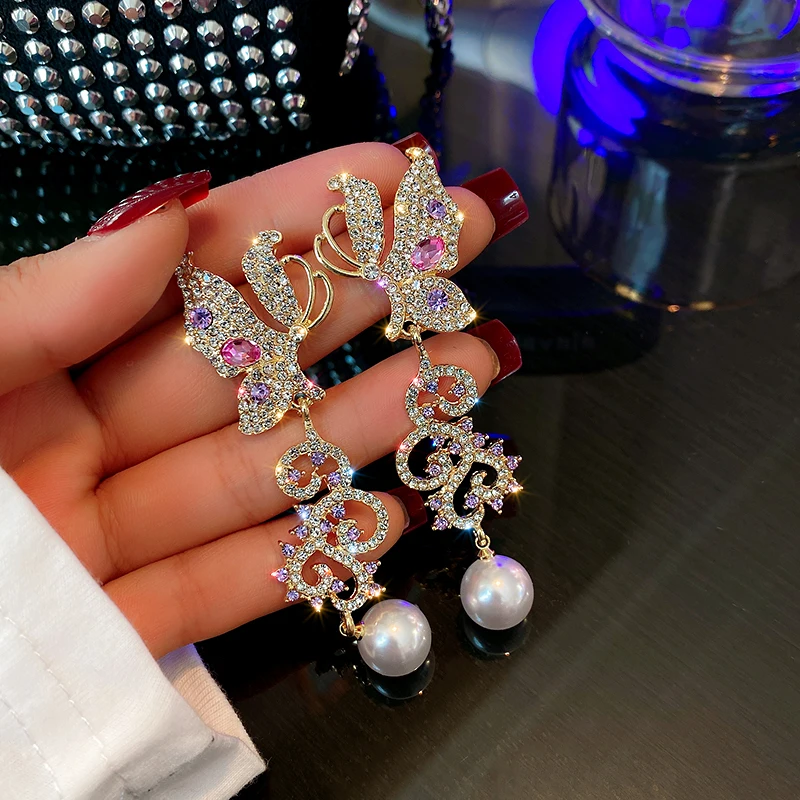 trendy fashion long dangle crystal purple butterfly earings
trendy fashion long dangle crystal purple butterfly earings