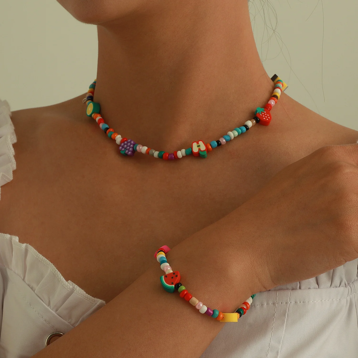 Boho Handmade Rainbow Beads Colorful Fruit Necklace Bracelet Set for Women, Silver color
Boho Handmade Rainbow Beads Colorful Fruit Necklace Bracelet Set for Women, Silver color