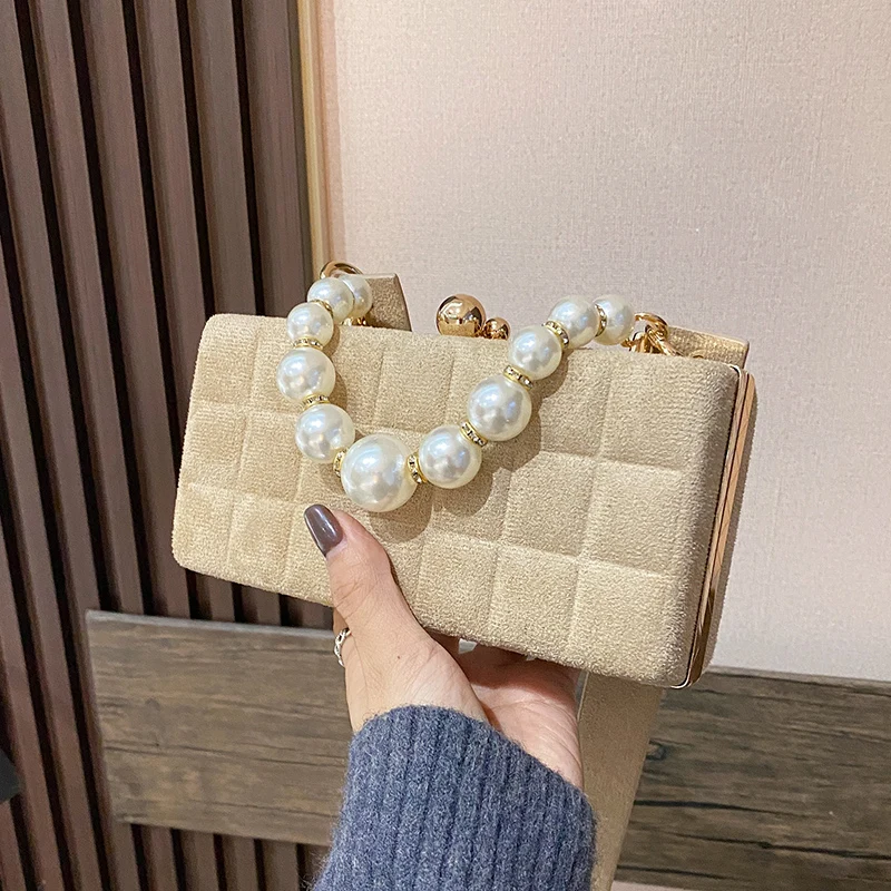 Wholesale fashion pearl handle faux leather bags small evening clutch handbags for lady small jelly bags
Wholesale fashion pearl handle faux leather bags small evening clutch handbags for lady small jelly bags