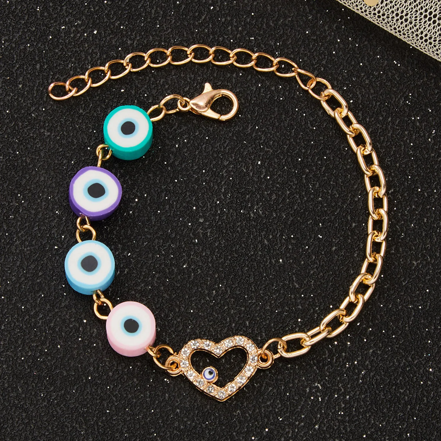 Fashionable Colorful Polyester Clay Evil Eyes Bracelet Gold Plated Micro Pave Zirconia Heart Bracelet
Fashionable Colorful Polyester Clay Evil Eyes Bracelet Gold Plated Micro Pave Zirconia Heart Bracelet