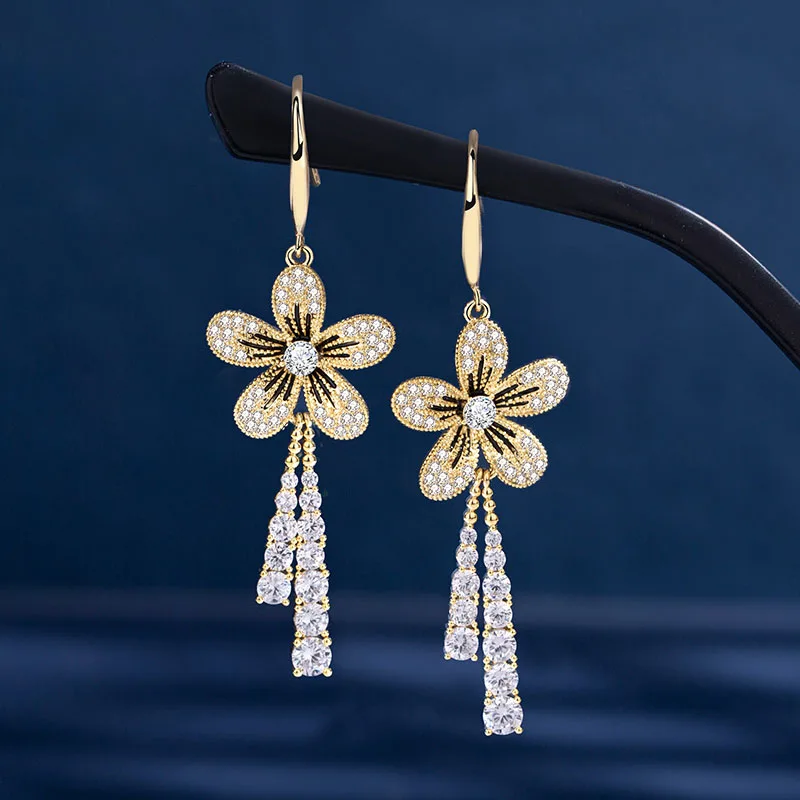 Korean version of the new flower tassel women's jewelry fashion rhinestone flower earrings
Korean version of the new flower tassel women's jewelry fashion rhinestone flower earrings