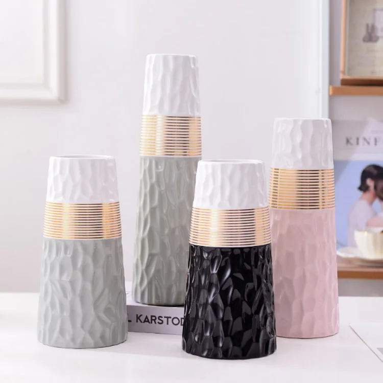 Simple modern INS Nordic gold white black pink grey two color desktop decor ceramic vase three piece set
Simple modern INS Nordic gold white black pink grey two color desktop decor ceramic vase three piece set