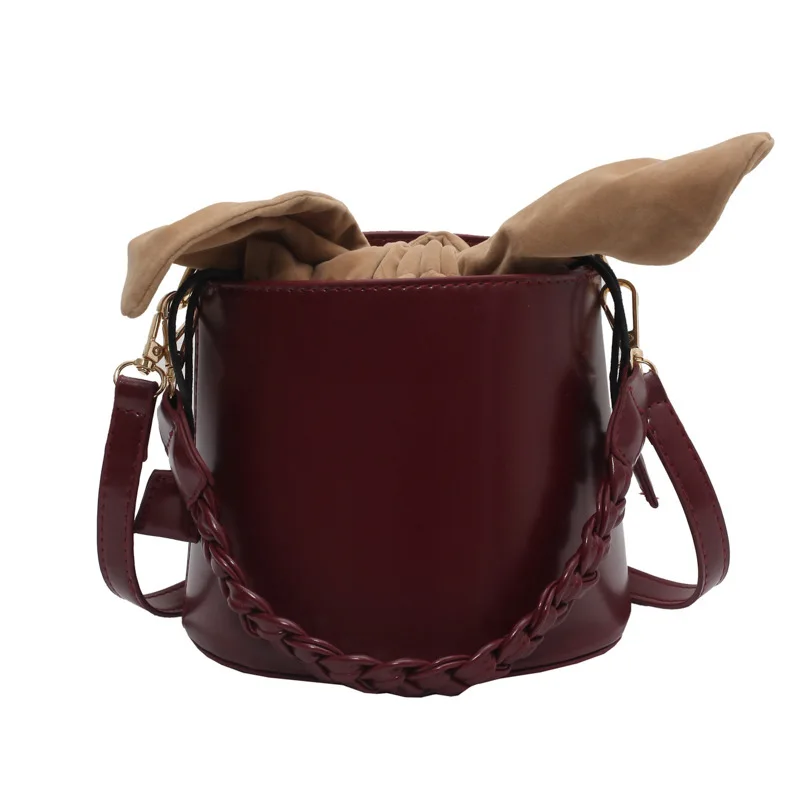 Rabbit ears shape bow fashion personality messenger bag wild atmosphere portable bucket bag
Rabbit ears shape bow fashion personality messenger bag wild atmosphere portable bucket bag