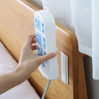 The new power strip holder wall-mounted sticky strip power strip holder socket power storage bracket
The new power strip holder wall-mounted sticky strip power strip holder socket power storage bracket