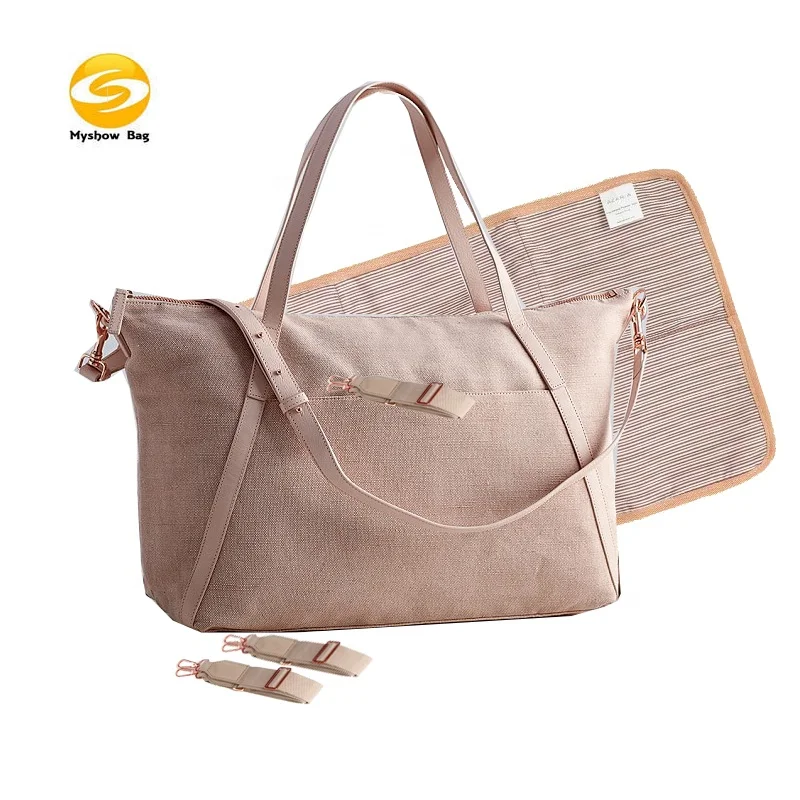 2020 new design diaper tote handbag,luxury cotton diaper bag baby bag with striped lining,low MOQ maternity bag for mom
2020 new design diaper tote handbag,luxury cotton diaper bag baby bag with striped lining,low MOQ maternity bag for mom