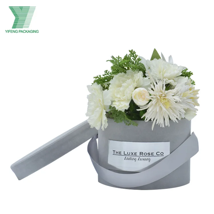 Yifeng customized label cardboard hat boxes for flowers packaging luxury velvet round flower box with custom ribbon handle
Yifeng customized label cardboard hat boxes for flowers packaging luxury velvet round flower box with custom ribbon handle