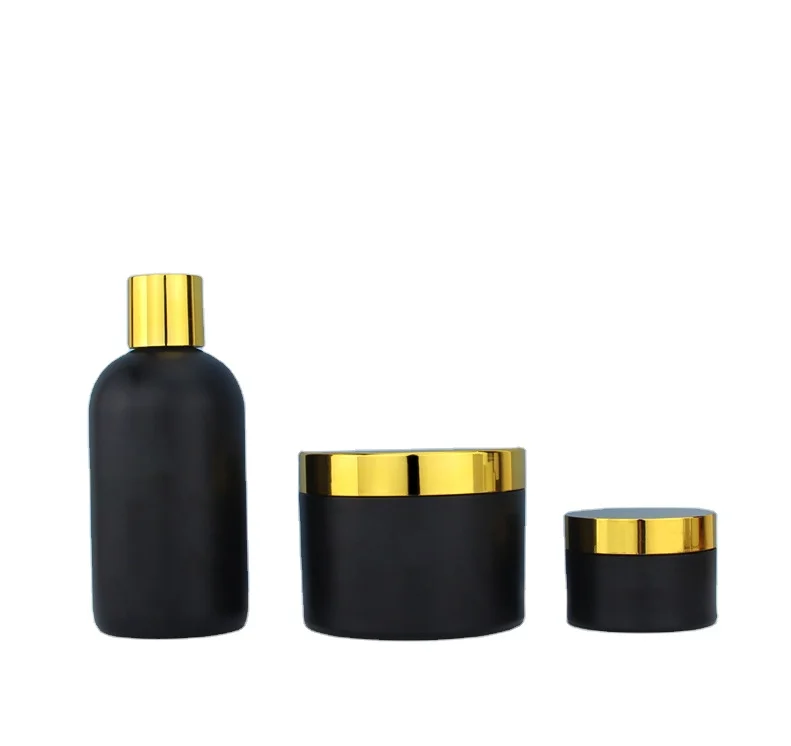 luxury cosmetic packing set plastic bottle jar cream 250ml matte black plastic PET cosmetic container jar with shiny gold lid
luxury cosmetic packing set plastic bottle jar cream 250ml matte black plastic PET cosmetic container jar with shiny gold lid