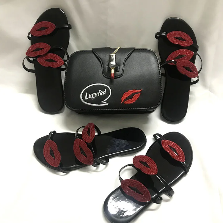 Women's Summer new black red mouth flat sandal shoe with matching hand bag and matching shoes
Women's Summer new black red mouth flat sandal shoe with matching hand bag and matching shoes