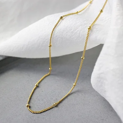 Fashion jewelry 925 Sterling Silver small bead ball necklace gold plated short clavicle chains necklace for women
Fashion jewelry 925 Sterling Silver small bead ball necklace gold plated short clavicle chains necklace for women