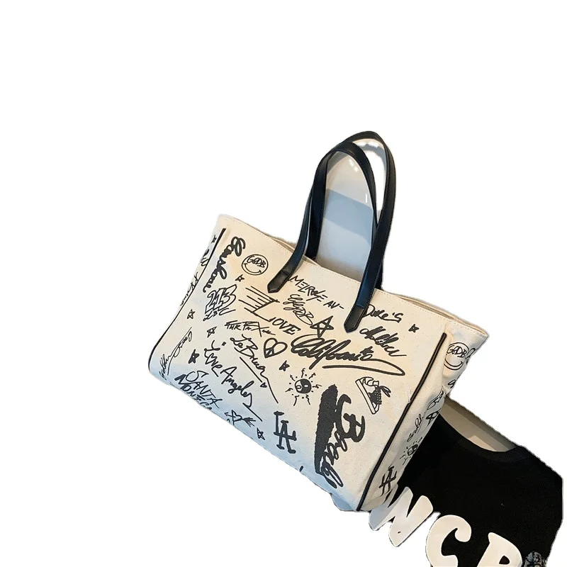 Large Capacity Graffiti Fashion Korean Version Cute Portable Tote Shoulder Bag Canvas Bag
Large Capacity Graffiti Fashion Korean Version Cute Portable Tote Shoulder Bag Canvas Bag