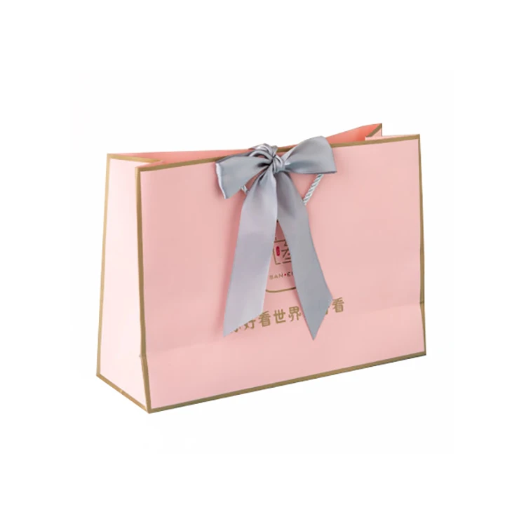 Custom Glossy Laminated White  Fashion Paper Shopping Bag with Bow Tie Ribbon.jpg