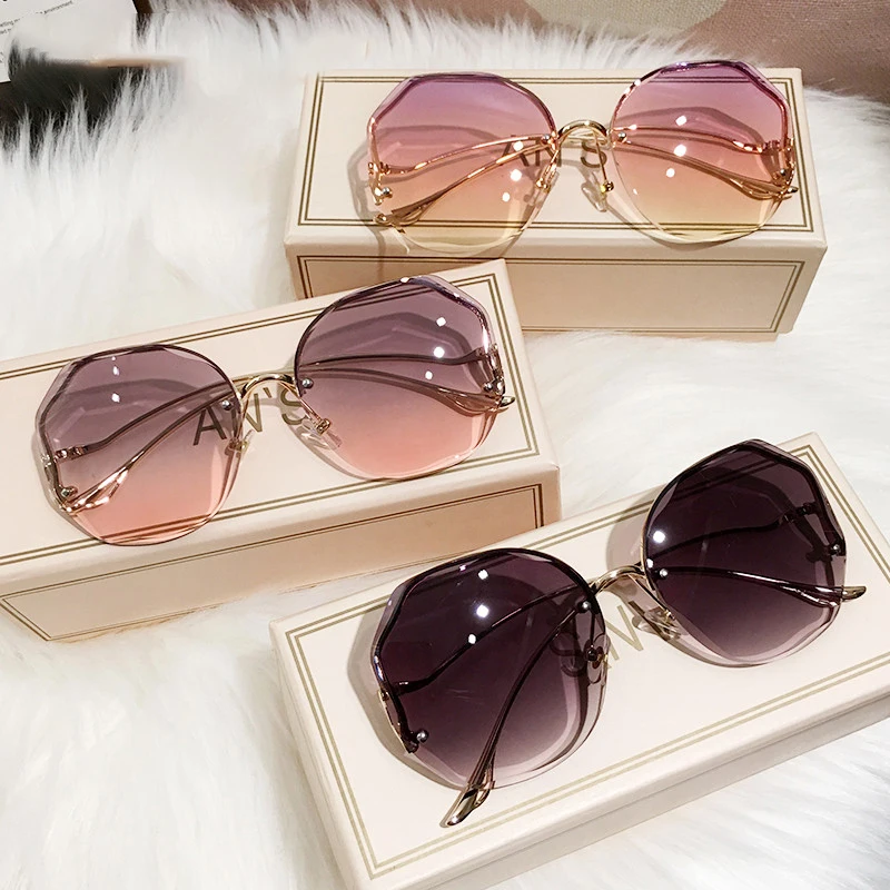 Cut Trimmed Lens Metal Curved Temples Resin Lens Rimless Sunglasses 2021 Fashion Women Sunglasses
Cut Trimmed Lens Metal Curved Temples Resin Lens Rimless Sunglasses 2021 Fashion Women Sunglasses