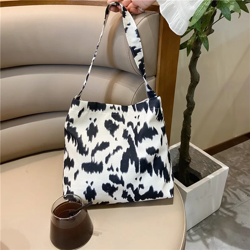 Summer Japanese style cow pattern fashion custom ladies single shoulder large capacity shopping bag wholesale 
Summer Japanese style cow pattern fashion custom ladies single shoulder large capacity shopping bag wholesale