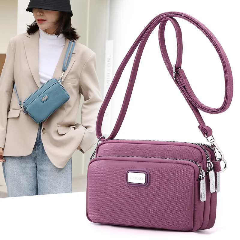 Shoulder messenger bag nylon handbag solid color women's messenger bag wallet mobile phone bag
Shoulder messenger bag nylon handbag solid color women's messenger bag wallet mobile phone bag