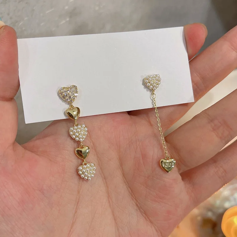 Korean Trendy 925 Silver Pin Heart Stud Earring Full Imitation Pearl Love Heart Asymmetric Earring
Korean Trendy 925 Silver Pin Heart Stud Earring Full Imitation Pearl Love Heart Asymmetric Earring