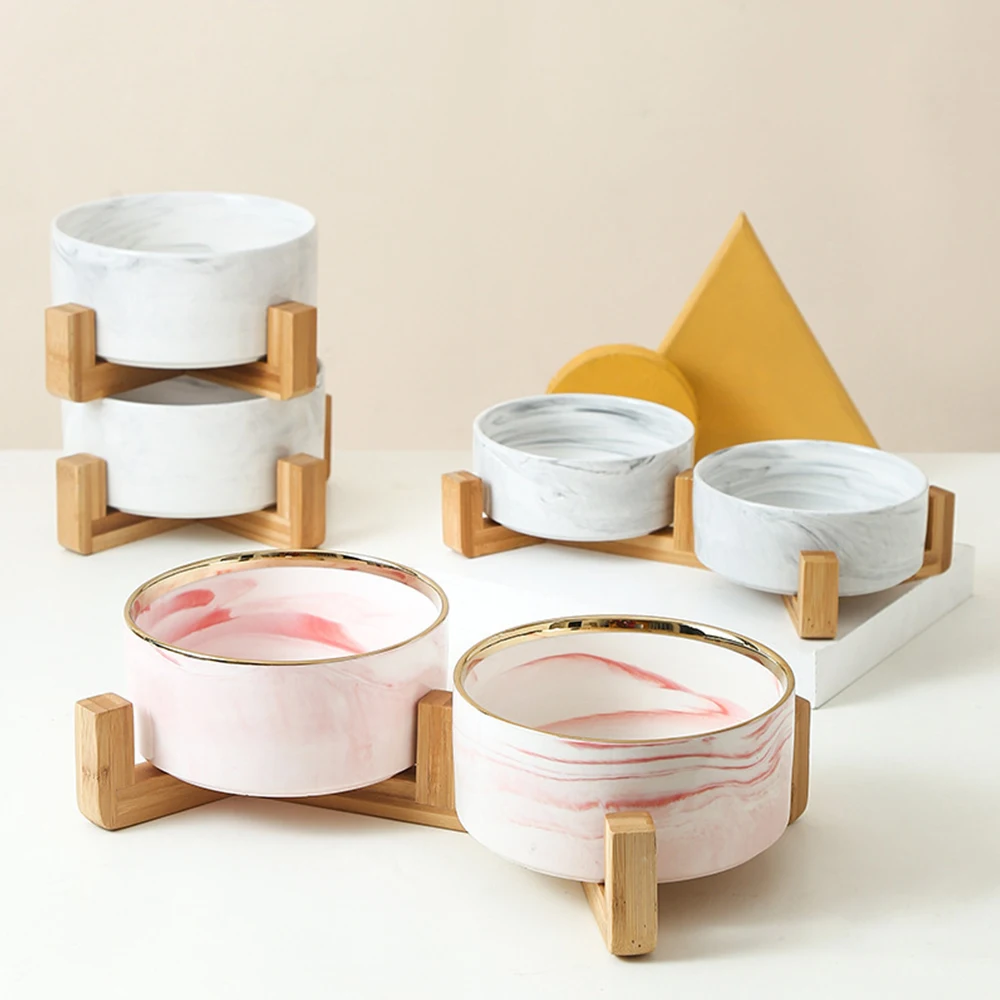 2022 New Design Pet Food Bowl 850ml Pet Feeding Bowl Ceramic Dog Bowl With Wood Stand
2022 New Design Pet Food Bowl 850ml Pet Feeding Bowl Ceramic Dog Bowl With Wood Stand