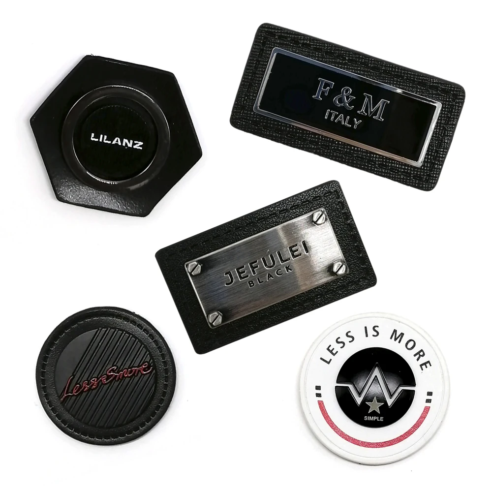 Custom Brand Name Logo Metal Label PU Leather Patches Label Sewing Clothes Label for Garment Jacket Jeans Handbags Blazers Shoes
Custom Brand Name Logo Metal Label PU Leather Patches Label Sewing Clothes Label for Garment Jacket Jeans Handbags Blazers Shoes